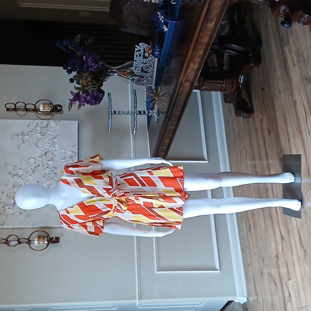 New Vibrant Orange and Yellow Patterned Wrap Mini Rorper. Size L - Picture 11 of 17